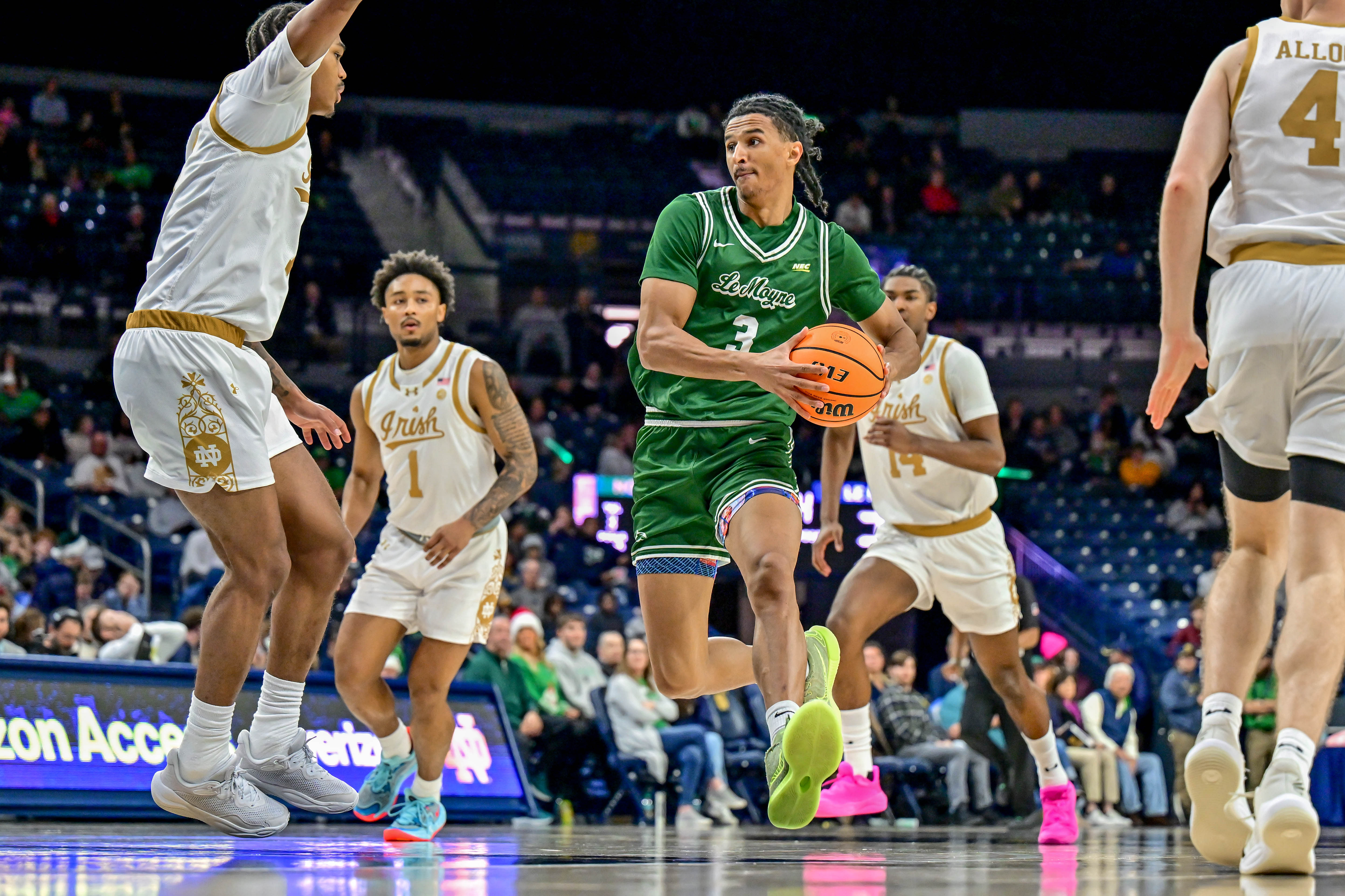 Le Moyne Dolphins forward Dwayne Koroma (#3) in action against the Notre Dame Fighting Irish at the Purcell Pavilion. Photo: Imagn